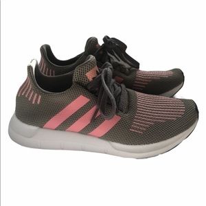 Green and pink Adidas